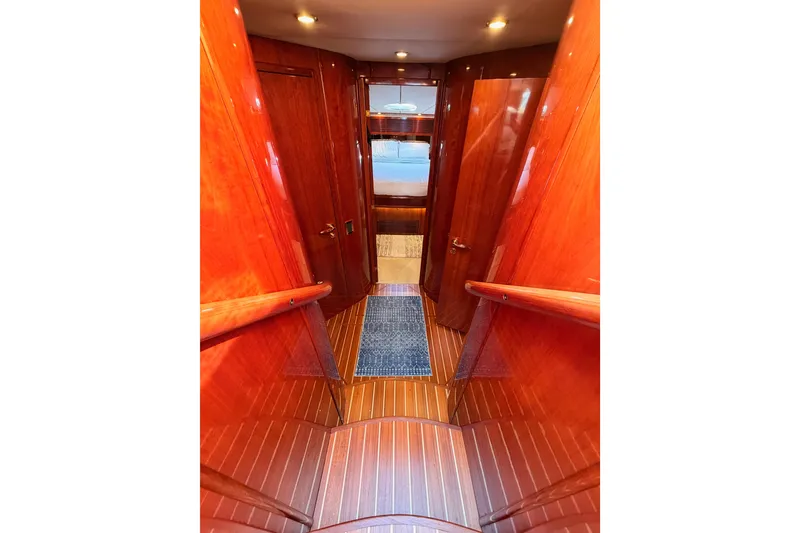 Slide: The Image of Luxurious wooden interior hallway of a 2001 Fairline 55 yacht. - 93
