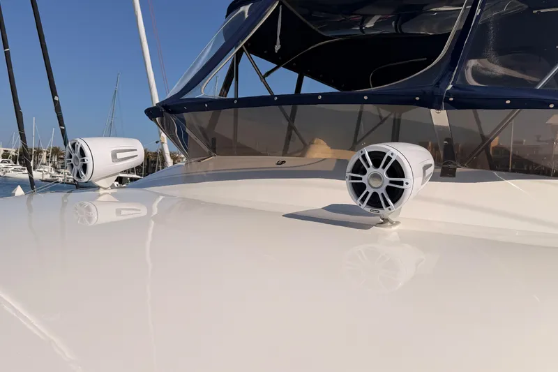 Slide: The Image of Fairline 55 yacht (2001) with marine speakers on deck, docked at marina. - 55