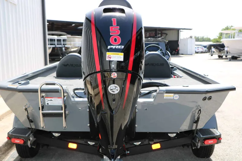 Slide: The Image of The image shows a 2026 Vexus AVX 1980 boat with a 150 HP Pro engine. - 12
