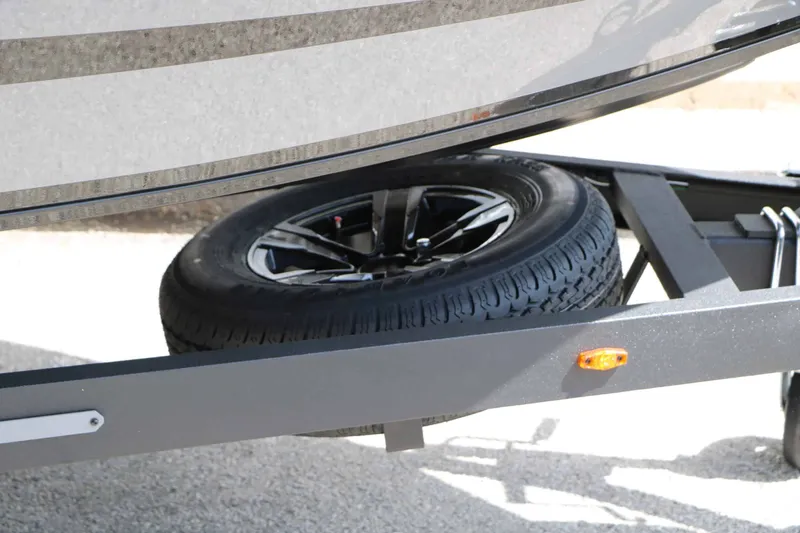 Slide: The Image of Close-up of a boat trailer with a spare tire. - 21