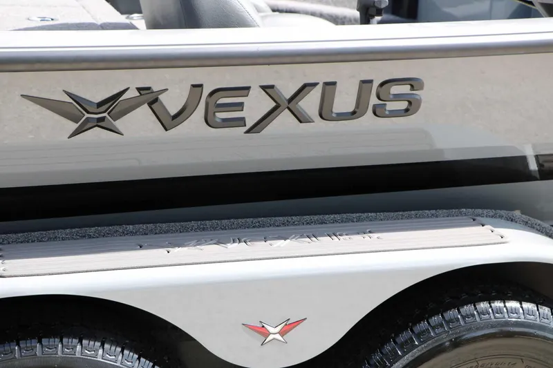 Slide: The Image of Close-up of the Vexus AVX 1980 with shiny logo and tire. - 16