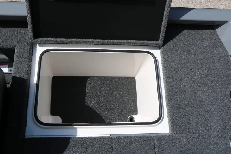 Slide: The Image of An open storage compartment on a 2026 Vexus AVX 1980 boat. - 35