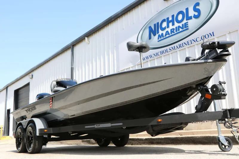 Slide: The Image of 2026 Vexus AVX 1980 in front of a building with a Nichols Marine sign. - 8