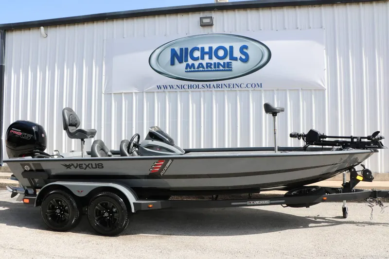 Slide: The Image of A gray 2026 Vexus AVX 1980 boat on a trailer in front of a building. - 4