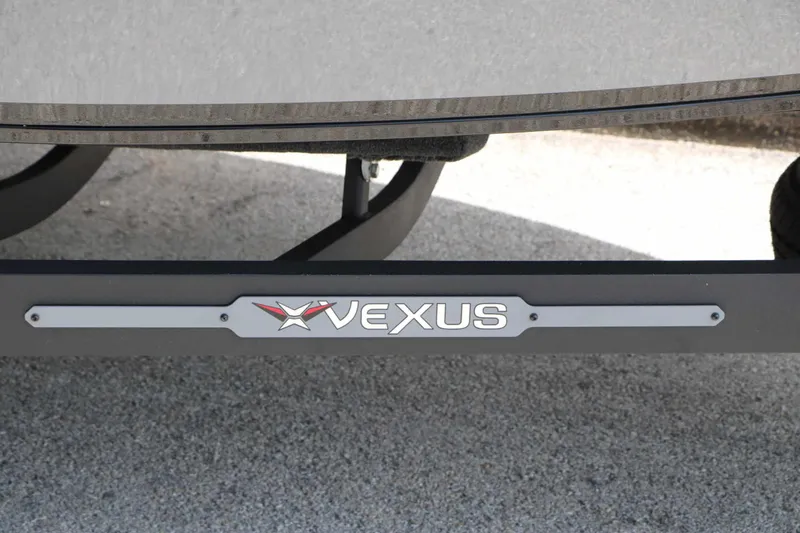 Slide: The Image of Close-up of the Vexus logo on a boat trailer. - 20