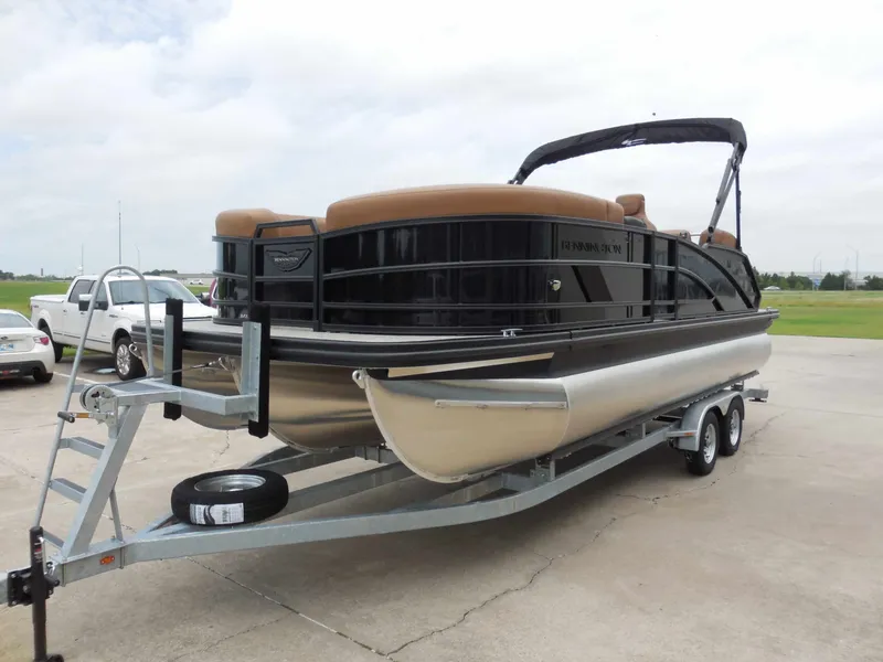Slide: The Image of A Bennington 22MSB pontoon boat on a trailer, ready for transport. - 8