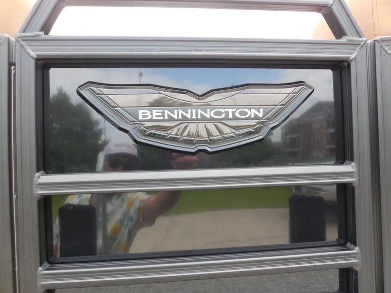 Slide: The Image of Close-up of the Bennington logo on a boat. - 11