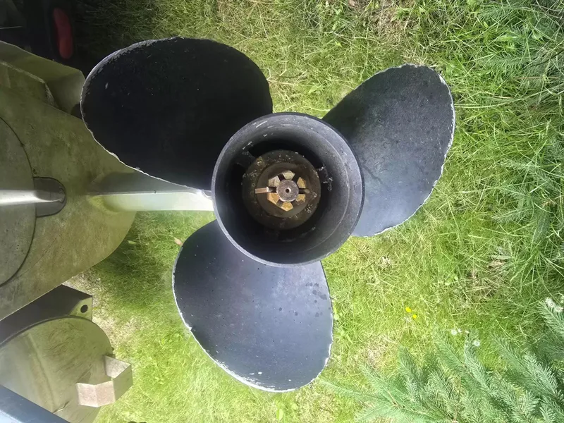 Slide: The Image of Close-up of a three-blade propeller on grass. - 12