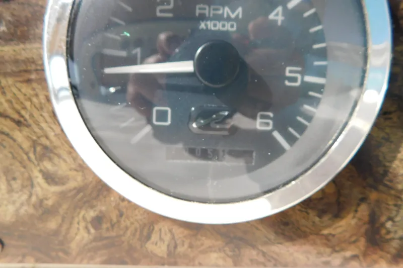 Slide: The Image of Close-up of RPM gauge on 1997 Sea Ray 330 Express Cruiser dashboard. - 31