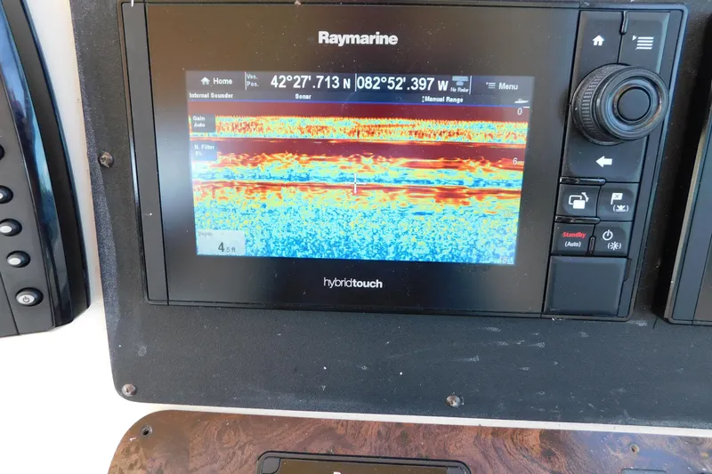 Slide: The Image of Raymarine sonar display on 1997 Sea Ray 330 Express Cruiser, showing depth and sonar data. - 36