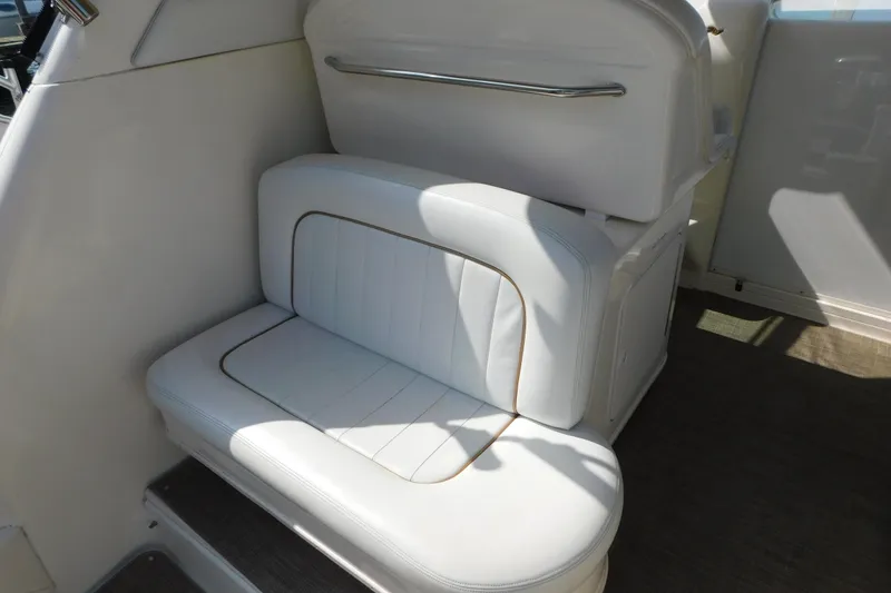 Slide: The Image of White seating area on a 1997 Sea Ray 330 Express Cruiser boat. - 40