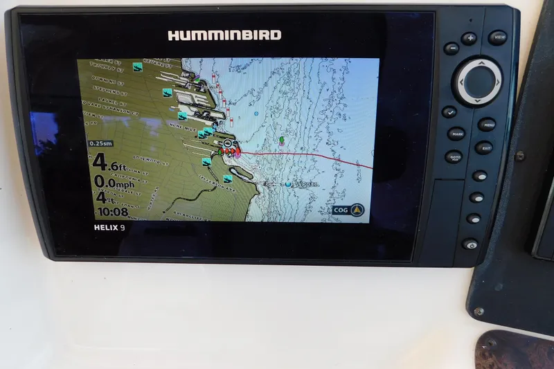 Slide: The Image of Humminbird Helix 9 GPS display on 1997 Sea Ray 330 Express Cruiser showing navigation map. - 37