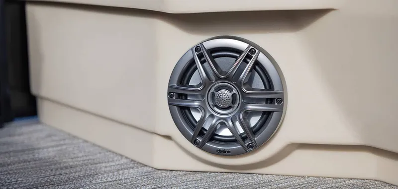 Slide: The Image of Close-up of a speaker on a boat, mounted in a beige wall. - 16