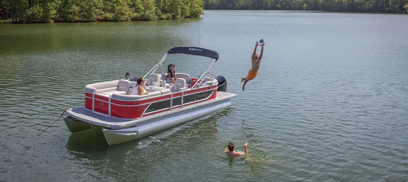 Slide: The Image of People enjoying a boat ride on a calm lake. - 17