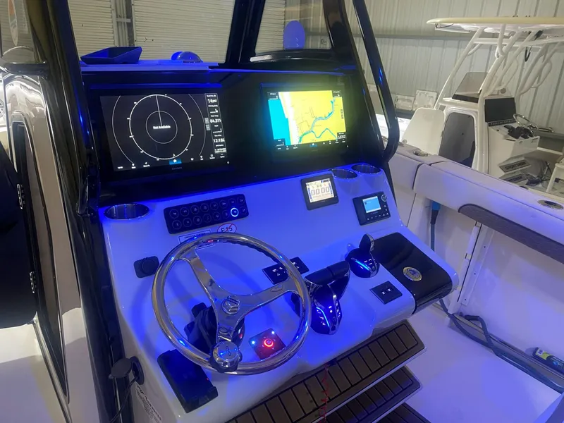 Slide: The Image of Tidewater 302 Center Console Adventure 2025 - 5