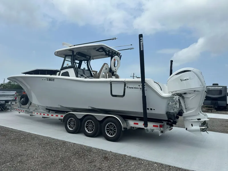 Slide: The Image of Tidewater 302 Center Console Adventure 2025 - 2
