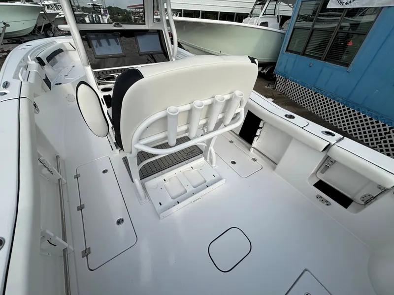 Slide: The Image of The image shows the cockpit of a 2026 Tidewater 272 Center Console Adventure boat. - 10