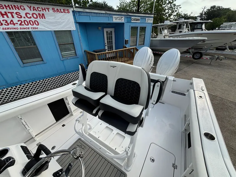 Slide: The Image of The image shows the cockpit of a Tidewater 272 Center Console Adventure boat. - 4