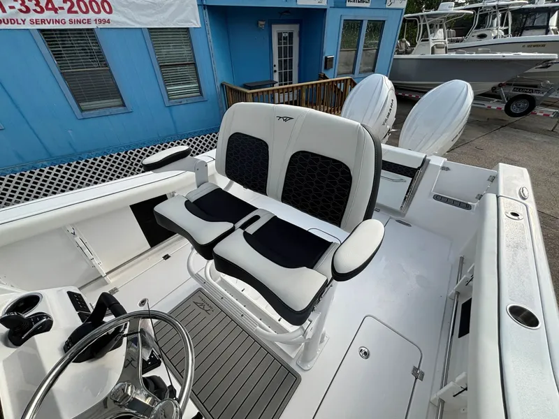 Slide: The Image of Interior view of a Tidewater 272 Center Console Adventure with modern seating and helm. - 12