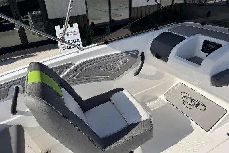Slide: The Image of 2024 Tahoe T21 boat interior with modern seating and dashboard design. - 13