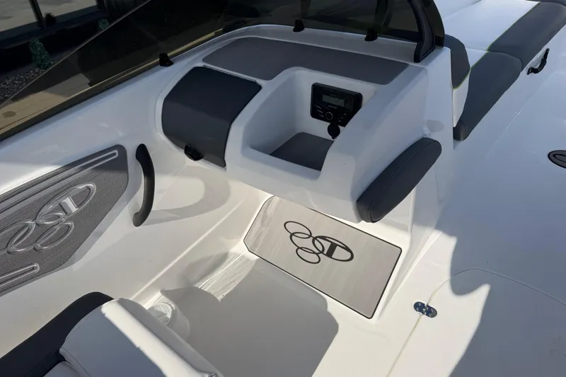 Slide: The Image of 2024 Tahoe T21 boat interior with sleek dashboard and seating. - 22