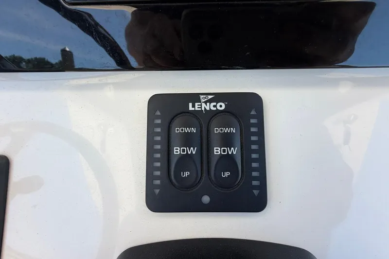 Slide: The Image of Lenco trim tab control panel on 2016 Edgewater 368CC boat. - 58