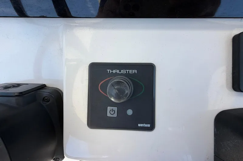 Slide: The Image of Thruster control panel on 2016 Edgewater 368CC boat, featuring Vetus branding. - 61