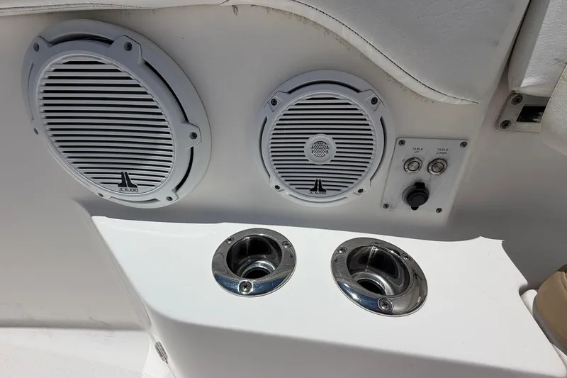 Slide: The Image of Edgewater 368CC 2016 boat speakers and controls on white panel. - 71