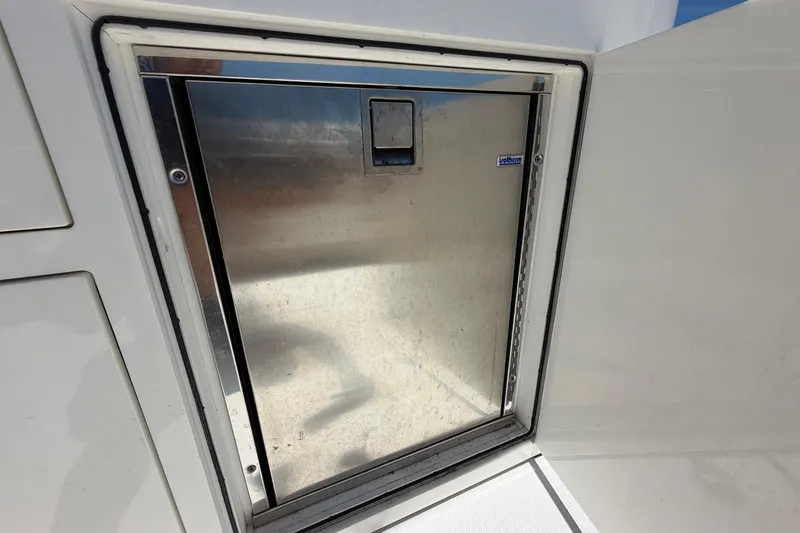 Slide: The Image of Stainless steel hatch on 2016 Edgewater 368CC boat, featuring a sleek, modern design. - 52