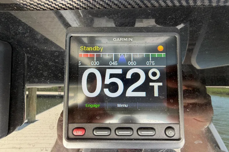 Slide: The Image of Garmin marine display showing 52 degrees on a 2016 Edgewater 368CC boat. - 56