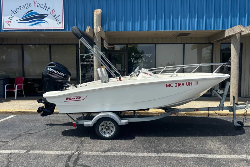 The Image of 2019 Boston Whaler 130 Super Sport boat on trailer at Anchorage Yacht Sales. - 1