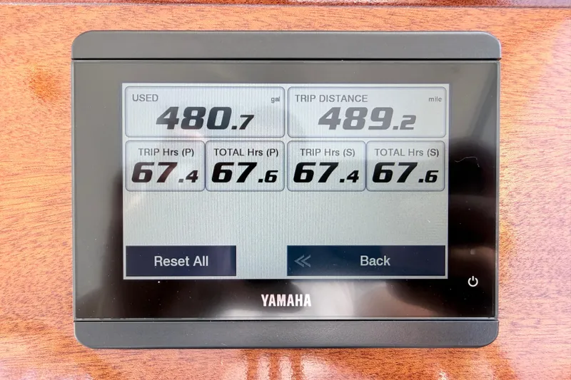 Slide: The Image of Yamaha display showing fuel usage and trip data on 2024 NorthCoast 315 HT boat. - 26