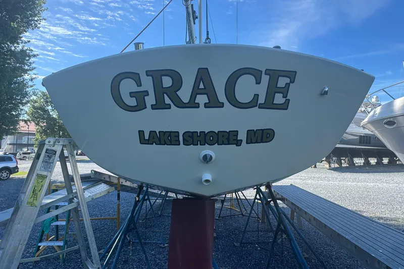 Slide: The Image of Alerion 28 sailboat named "Grace" from 1995, docked in Lake Shore, MD. - 11