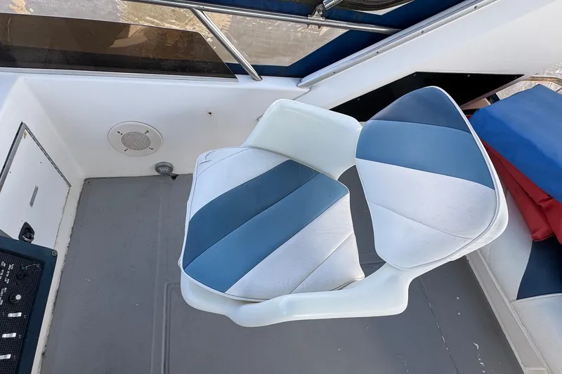 Slide: The Image of Blue and white seat on 1988 Sea Ray 415 Aft Cabin boat deck. - 14