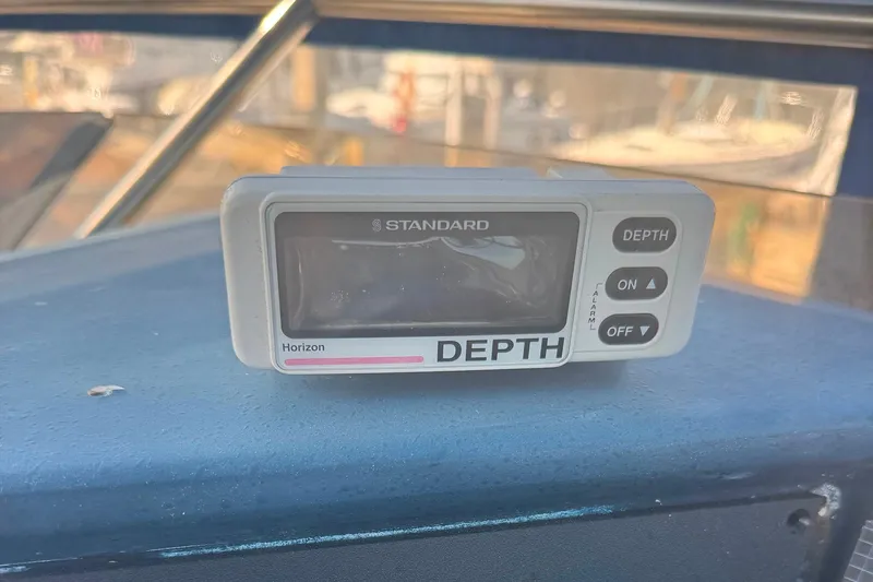 Slide: The Image of Depth gauge on 1988 Sea Ray 415 Aft Cabin boat dashboard. - 23