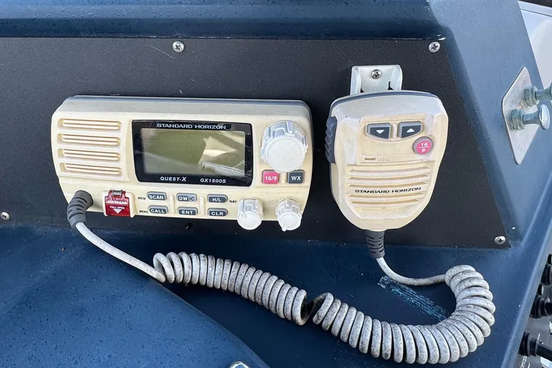 Slide: The Image of Standard Horizon radio equipment on 1988 Sea Ray 415 Aft Cabin boat dashboard. - 20