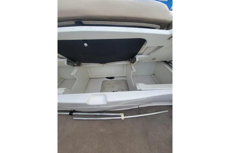 Slide: The Image of Open storage compartment in 2007 Four Winns 200 Horizon boat, showcasing interior space. - 14