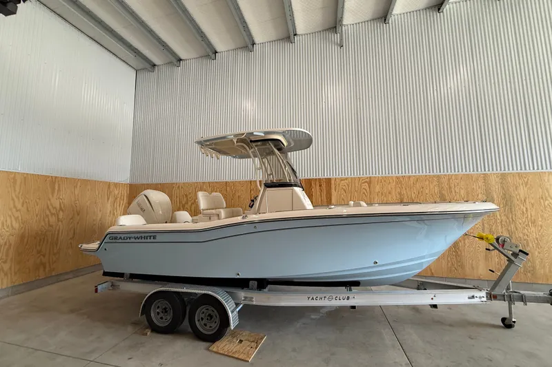 Slide: The Image of 2025 Grady-White Fisherman 216 boat on trailer in indoor storage. - 3
