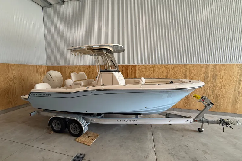 Slide: The Image of 2025 Grady-White Fisherman 216 boat on trailer in indoor storage. - 2