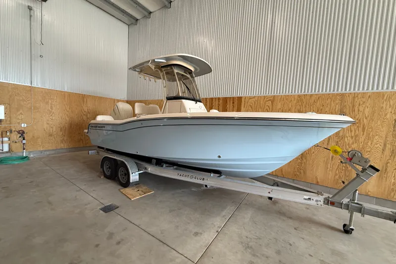 Slide: The Image of 2025 Grady-White Fisherman 216 boat on trailer in indoor storage. - 5