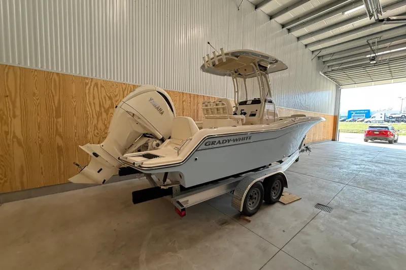 Slide: The Image of 2025 Grady-White Fisherman 216 boat on trailer in a garage. - 8