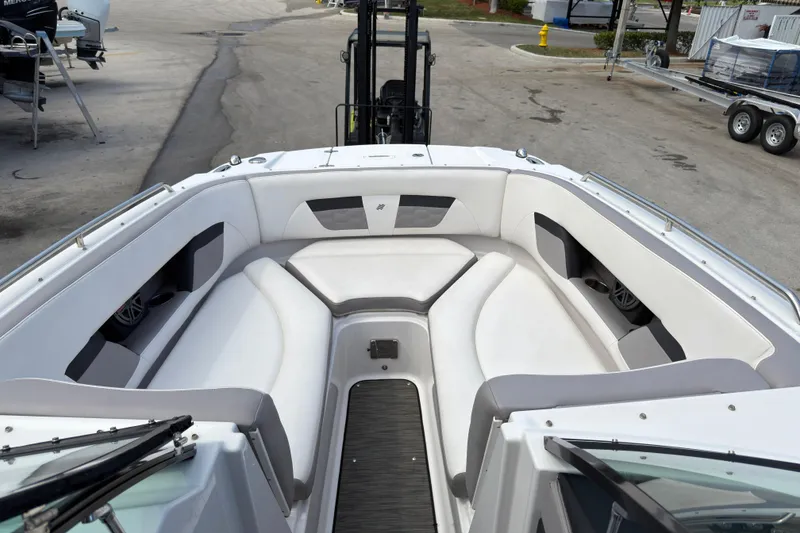 Slide: The Image of 2018 Four Winns HD270 OB boat interior with spacious seating and modern design. - 12