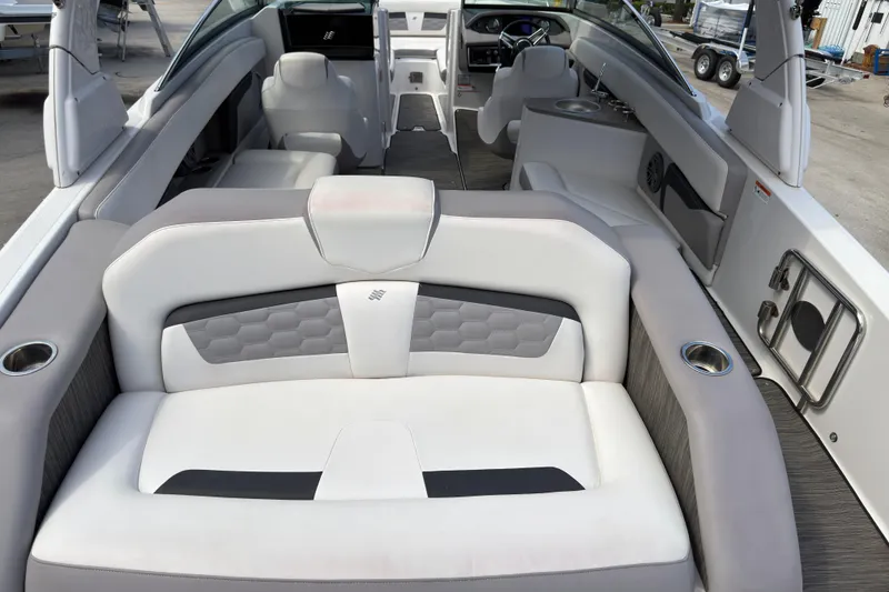 Slide: The Image of 2018 Four Winns HD270 OB boat interior with luxurious seating and modern design. - 3