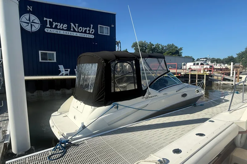 Slide: The Image of 2006 Sea Ray 240 Sundancer docked at True North Yacht Sales. - 26