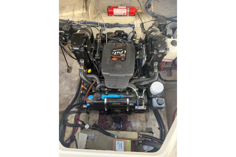 Slide: The Image of Engine compartment of a 2006 Sea Ray 240 Sundancer with MerCruiser 5.0 MPI engine. - 16