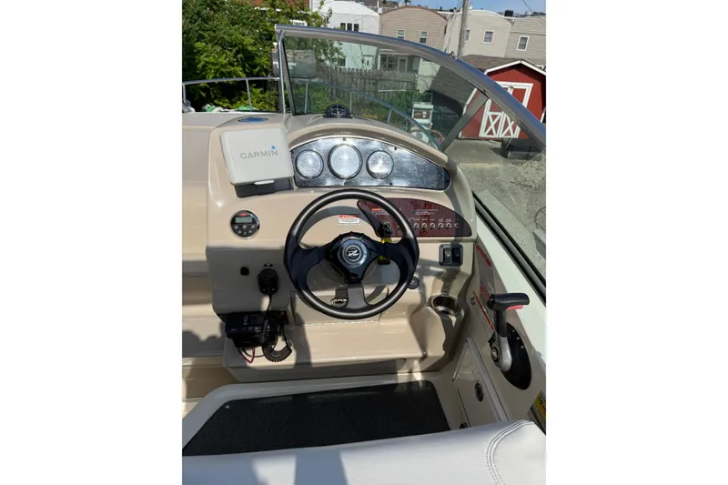 Slide: The Image of Steering console of 2006 Sea Ray 240 Sundancer with Garmin navigation system. - 20