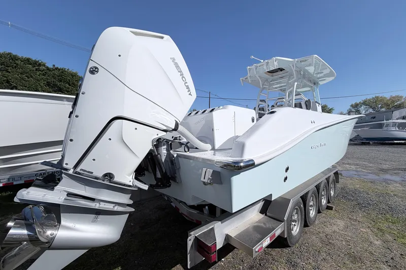 Slide: The Image of 2026 Cape Horn 39XS boat with Mercury outboard engines on a trailer. - 3