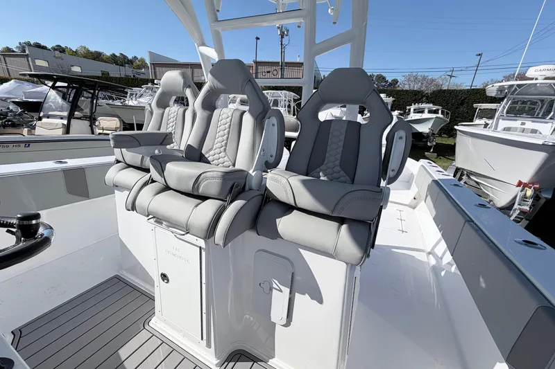 Slide: The Image of 2026 Cape Horn 39XS boat with luxurious seating and modern design in a marina setting. - 9