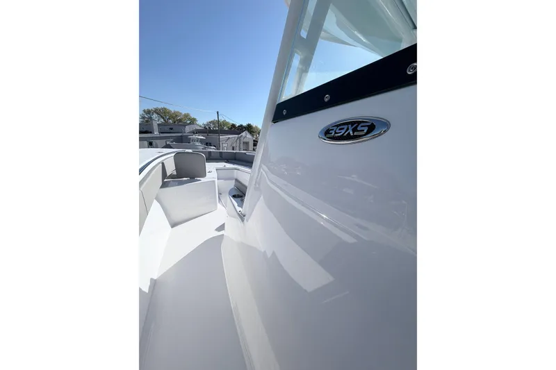 Slide: The Image of 2026 Cape Horn 39XS boat, sleek white exterior, sunny day, modern design. - 11