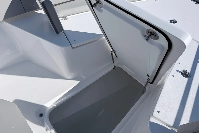 Slide: The Image of Open storage compartment on 2026 Cape Horn 39XS boat, showcasing sleek design and functionality. - 27